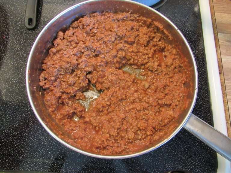Cooking ground venison for easy lasagna recipe.