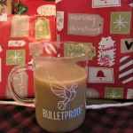 Bulletproof Coffee mug in front of Christmas presents