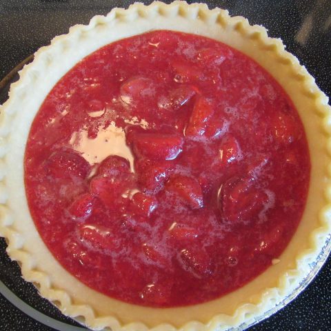 Pie filling in the raw pie crust
