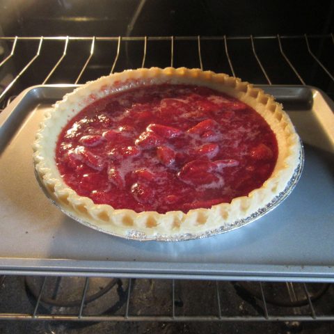 Strawberry pie in the oven to bake