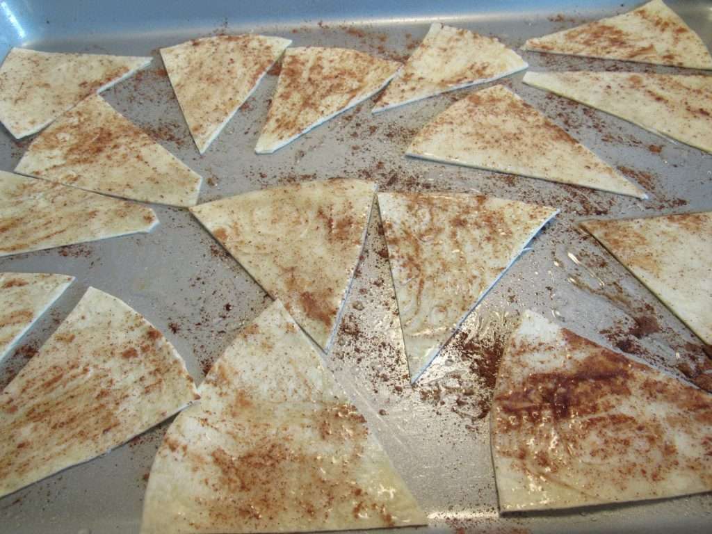 Fruit Dip with Greek Yogurt 7 Baking sheet with prepared cinnamon tortilla chips.