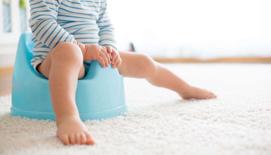 5 Potty Training Essentials You Must Have 7 child on potty chair