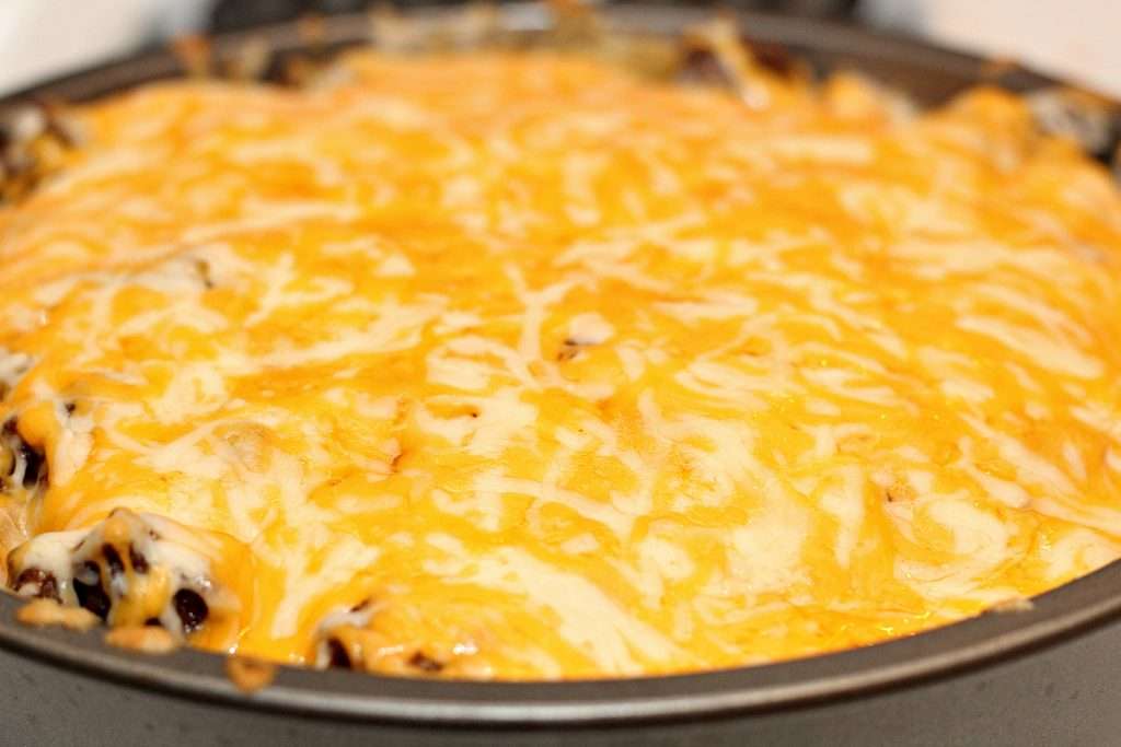Cheesy Taco Casserole 7 Taco Casserole with melted cheese on top in pan