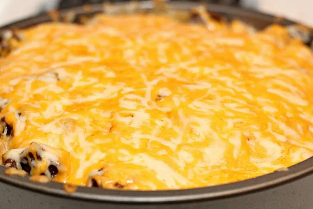 Cheesy Taco Casserole 7 Taco Casserole with melted cheese on top in pan
