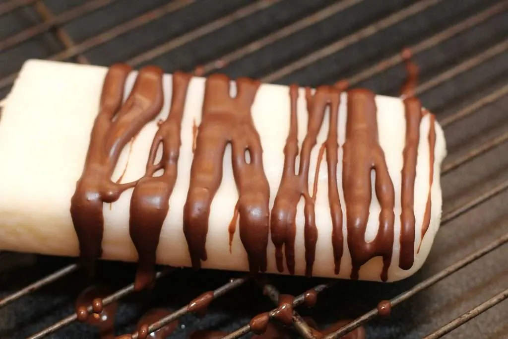 S'mores Ice Cream Pops with chocolate drizzle