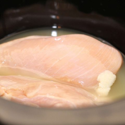 Chicken in broth in slow cooker