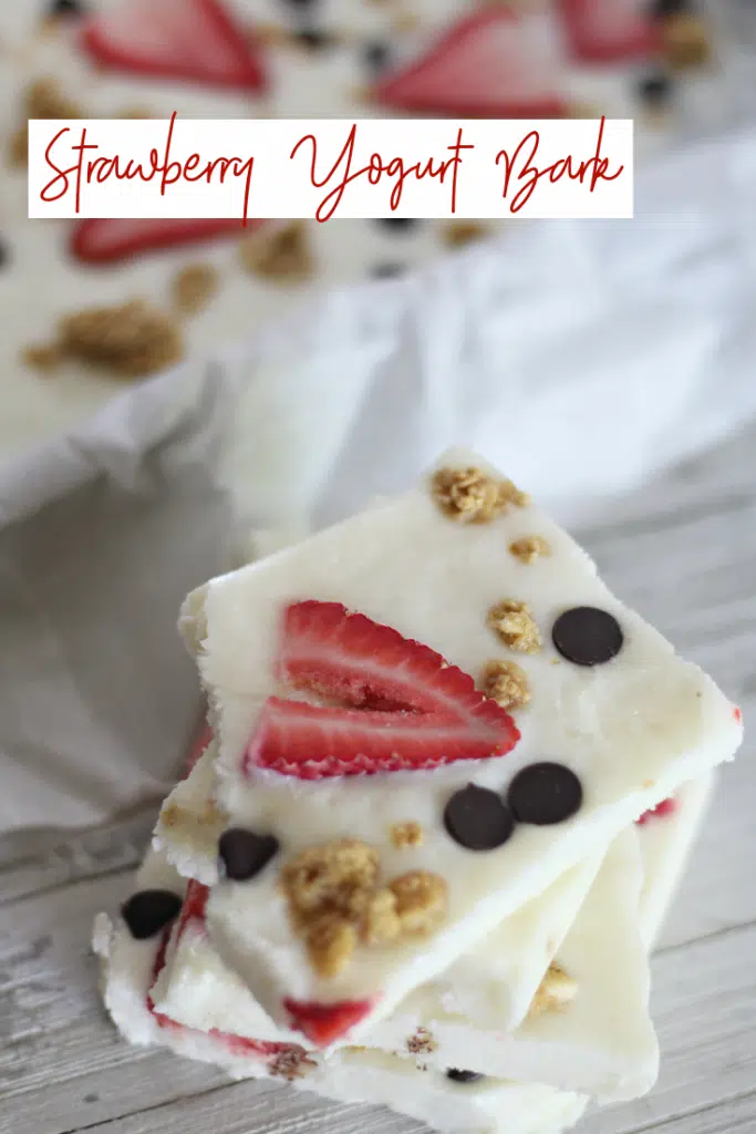 strawberry yogurt bark pieces stacked on each other