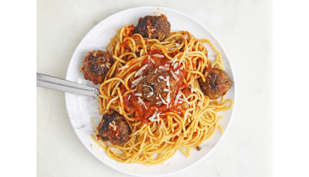 Instant Pot Spaghetti and Meatballs 4 spaghetti and meatballs on white plate