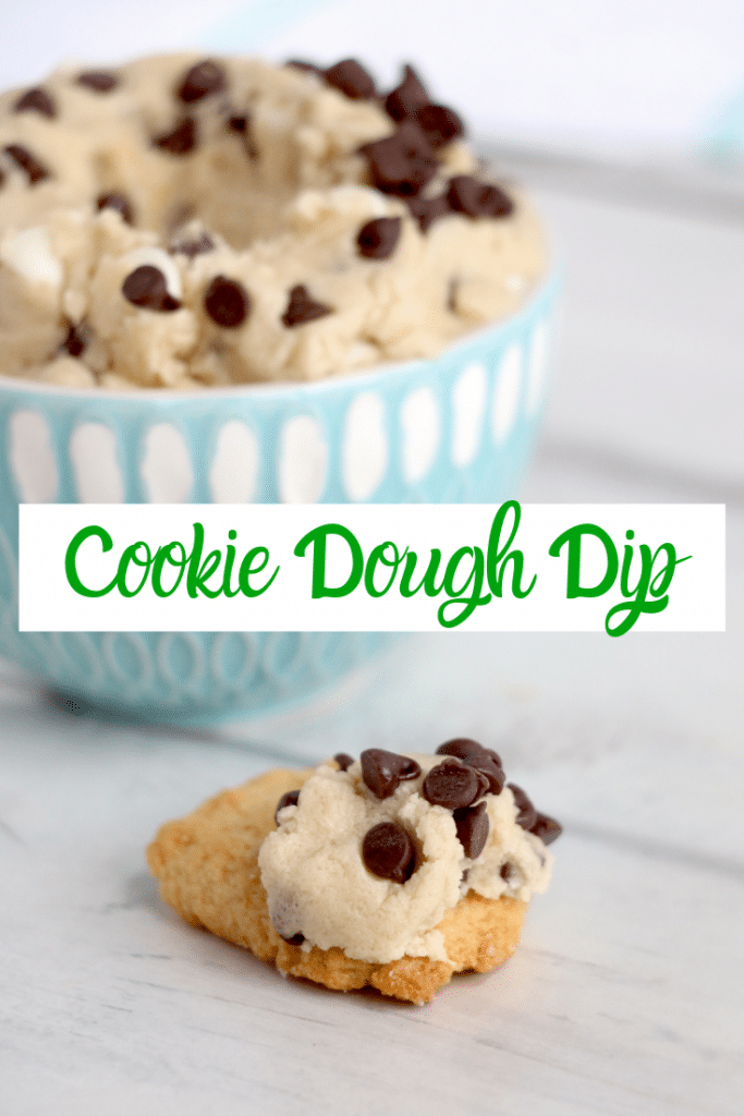 cookie dough dip in blue bowl, with some on a cookie