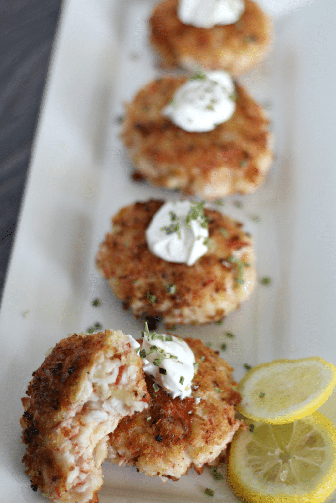 35 Party Appetizers For New Years Eve 5 spicy crab cakes on white plate