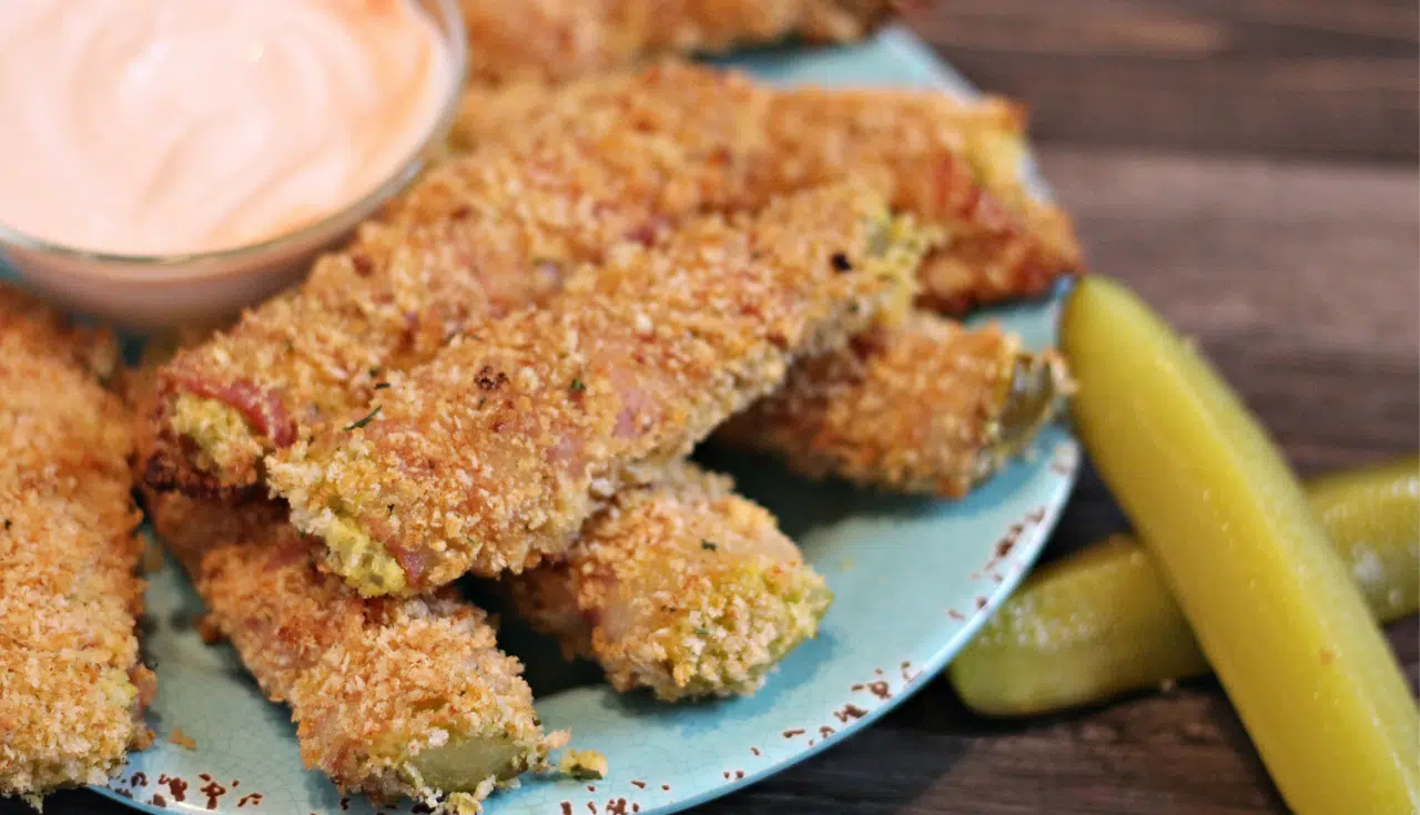 oven baked fried pickles on blue plate