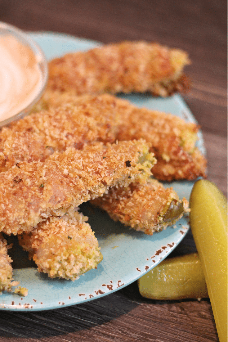 Oven Baked Bacon Wrapped Fried Pickles 2 fried pickles on a plate