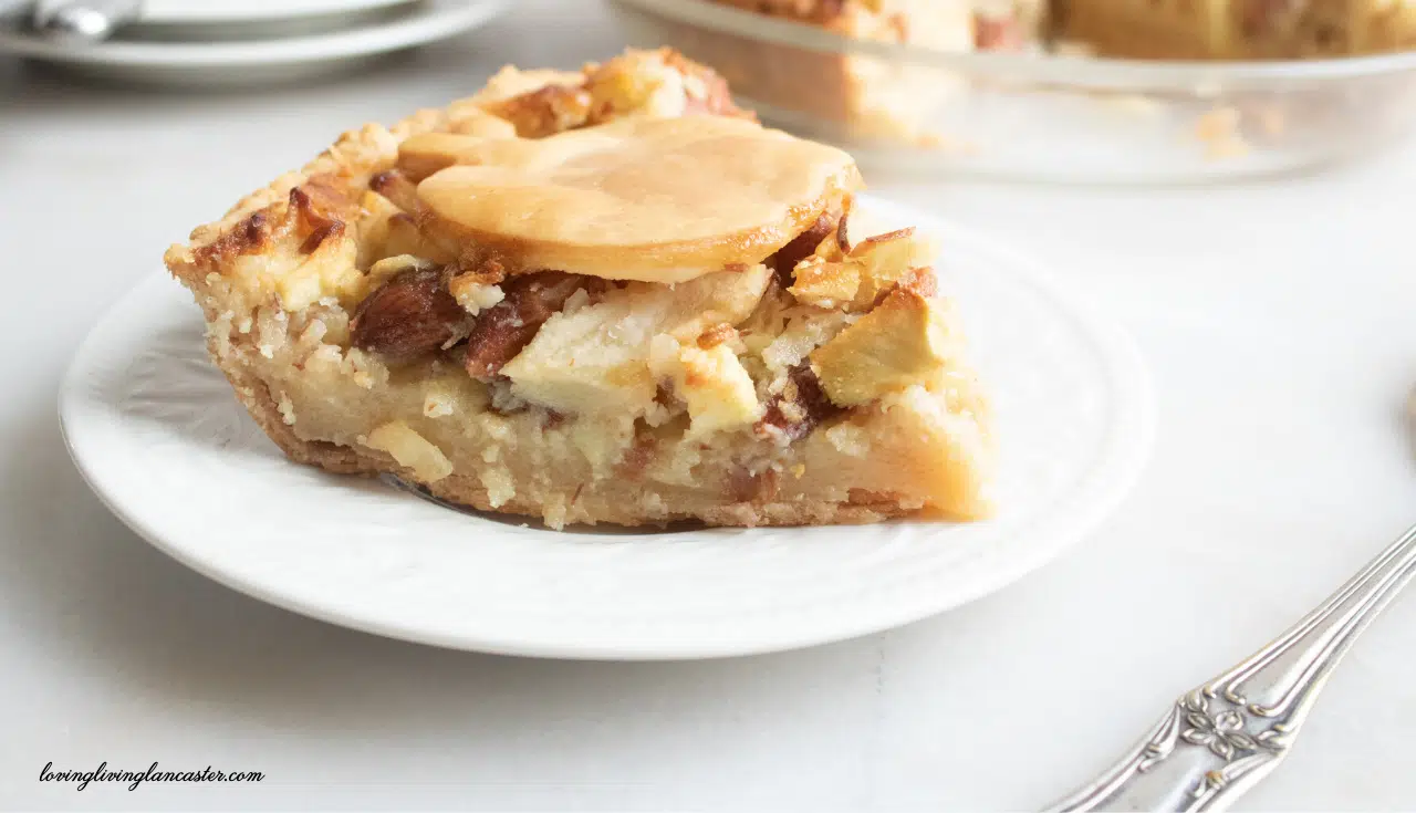 Almond Apple Pie 4 almond apple pie on a white plate
