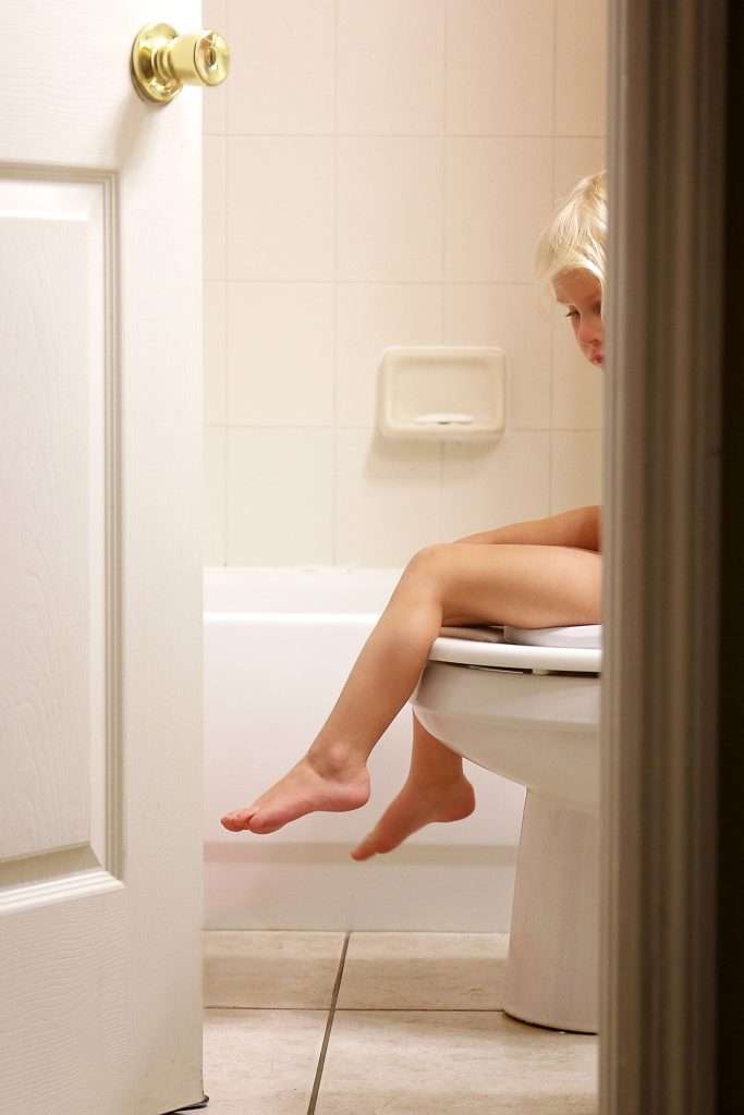 girl on potty chair