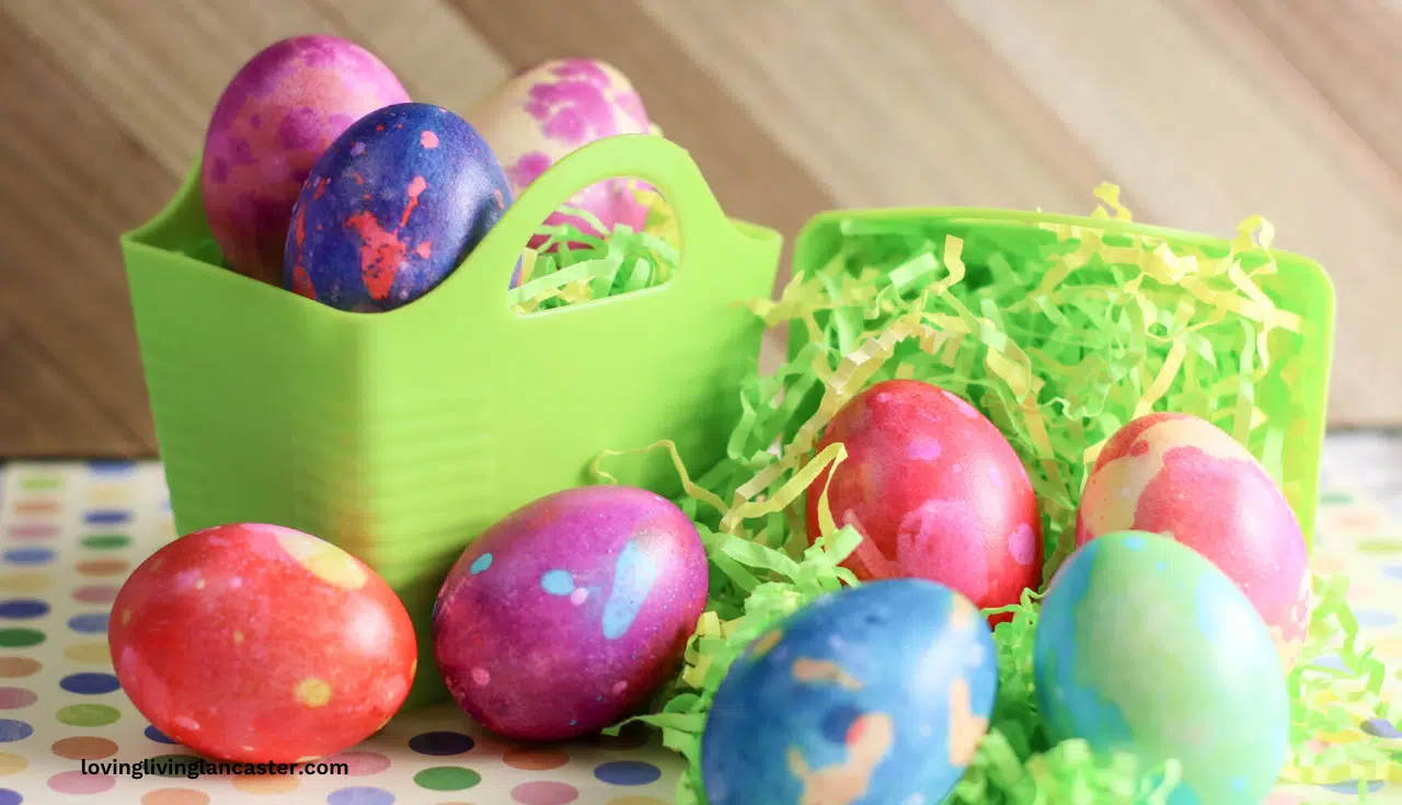 marbled easter eggs in a green basket