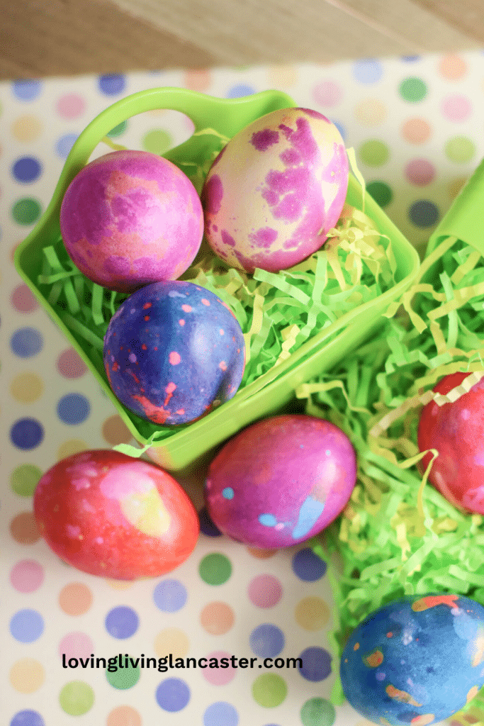 marble dyed easter eggs in a green basket