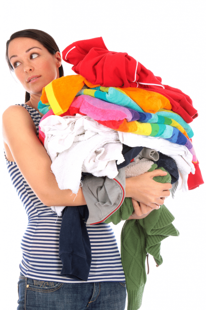woman holding laundry