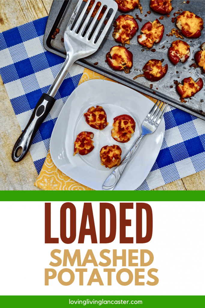 loaded potatoes on white plate and baking sheet