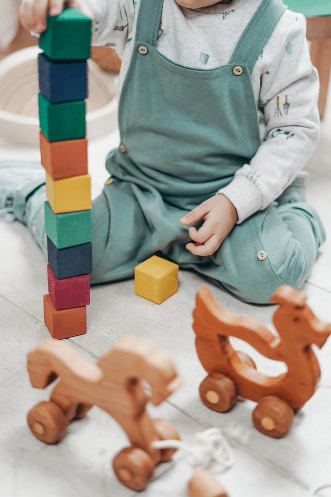 child building with blocks