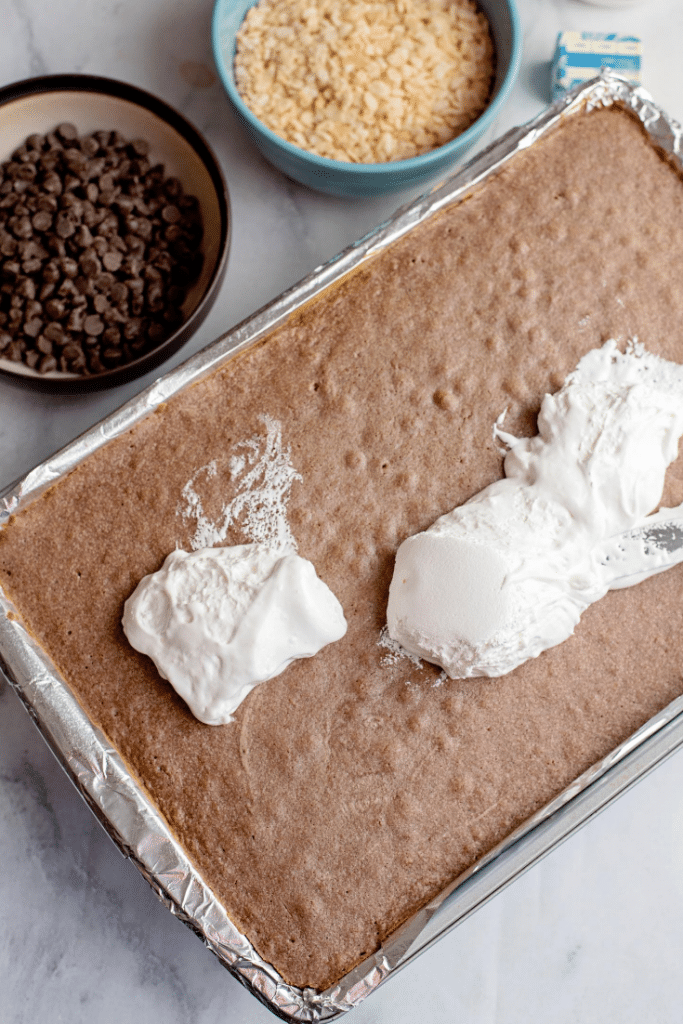 Chocolate Marshmallow Bars 19 Baked chocolate marshmallow bars base topped with marshmallow fluff.