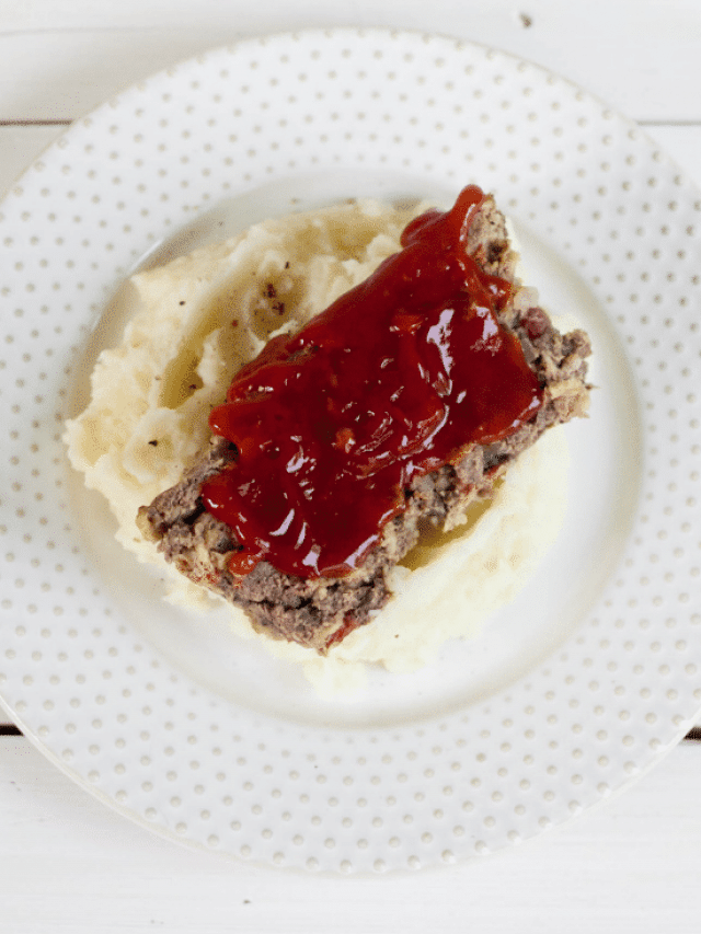 Venison Meatloaf 5 Venison Meatloaf with ketchup sauce on mashed potatoes on circle white plate
