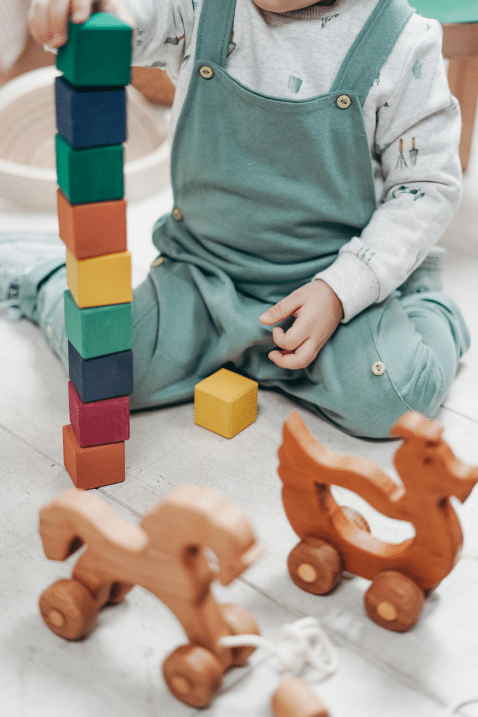 8 Strategies for Successful Homeschooling 9 child playing with blocks