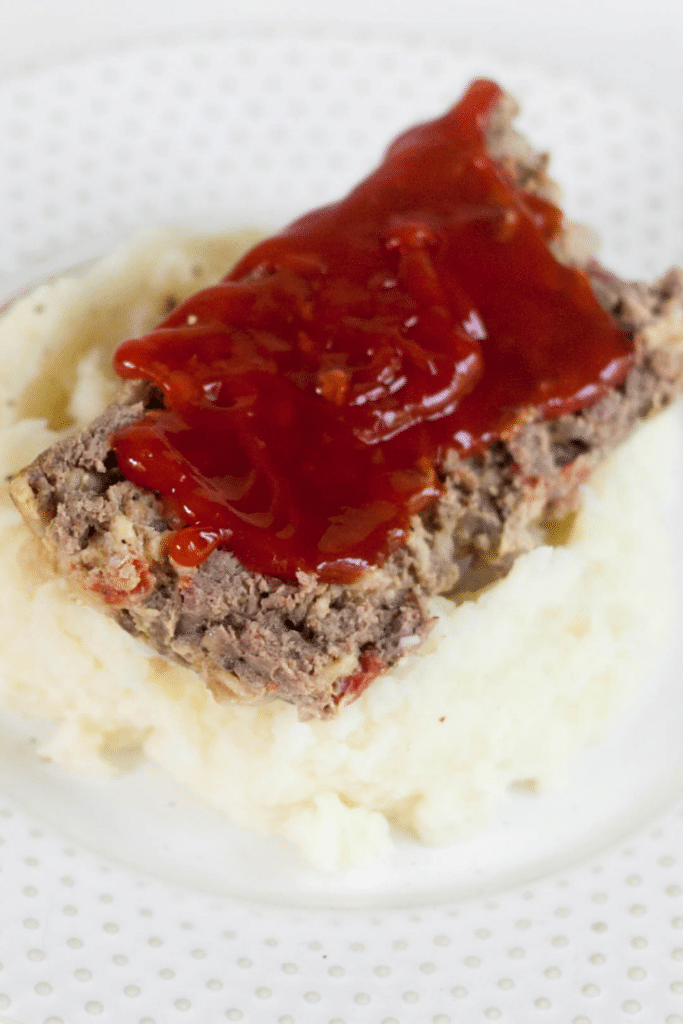 Venison Meatloaf with ketchup sauce on mashed potatoes