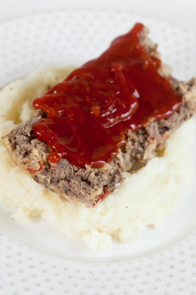 Venison Meatloaf 12 Venison Meatloaf with ketchup sauce on mashed potatoes