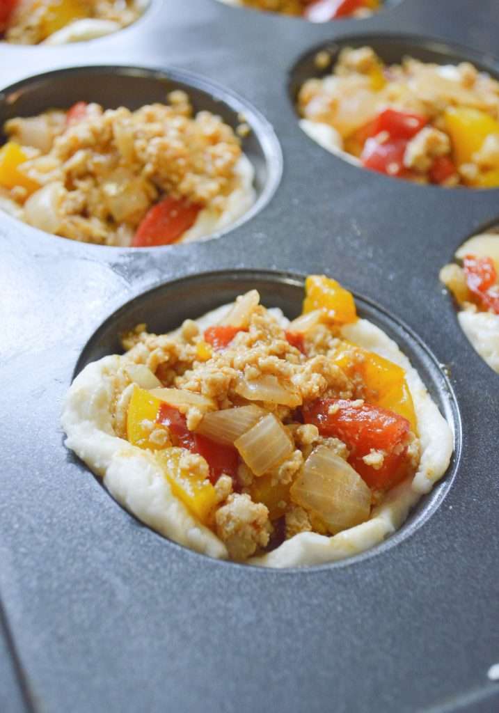 Taco Biscuit Cups 9 Chicken fajita filling added to the biscuit dough.