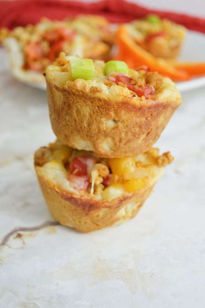 Taco Biscuit Cups 5 Close up of three taco biscuit cups stacked on top of each other.