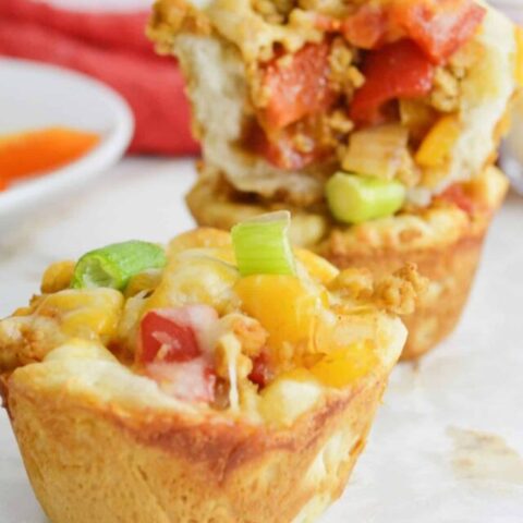 Close up of stacked taco biscuit cups.