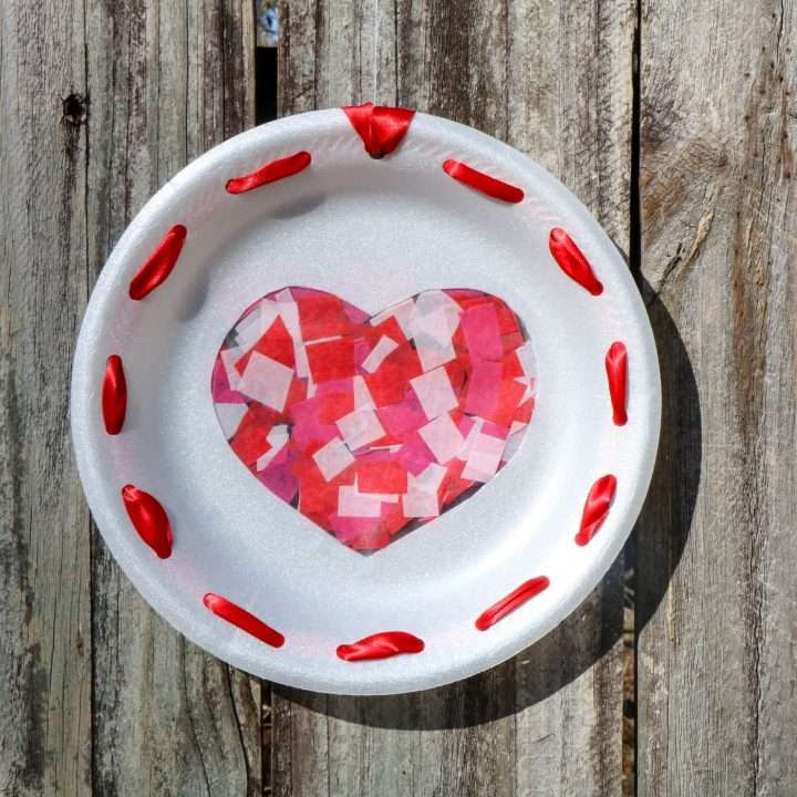 DIY Heart Sun Catcher for Kids 6 Heart Sun Catcher Craft on Wooden Background
