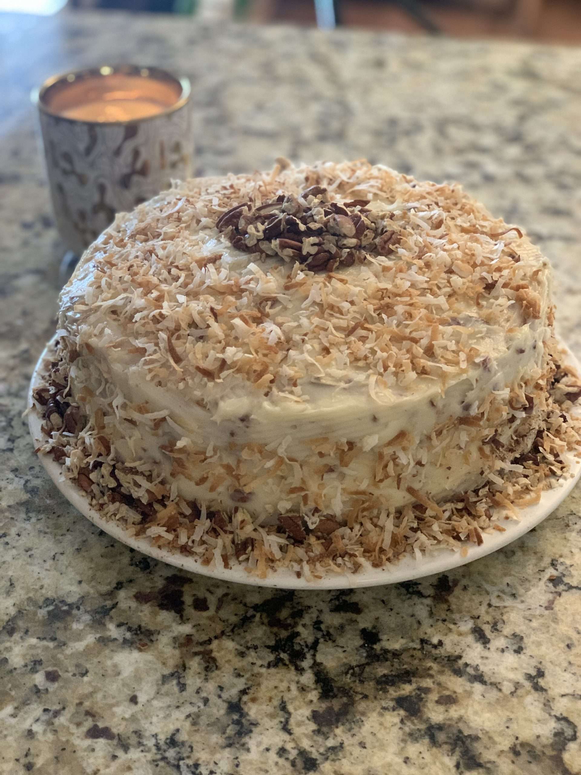 Decorated Italian Cream Cake from Cake Mix on Granite Counter