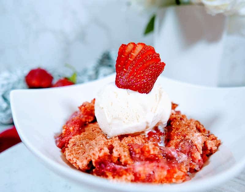 Easy Strawberry Dump Cake Dessert Recipe 3 Strawberries dump cake recipe on a plate