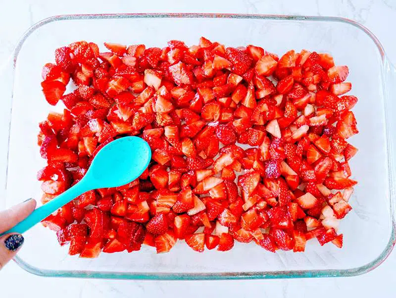 sliced strawberries in a baking dish