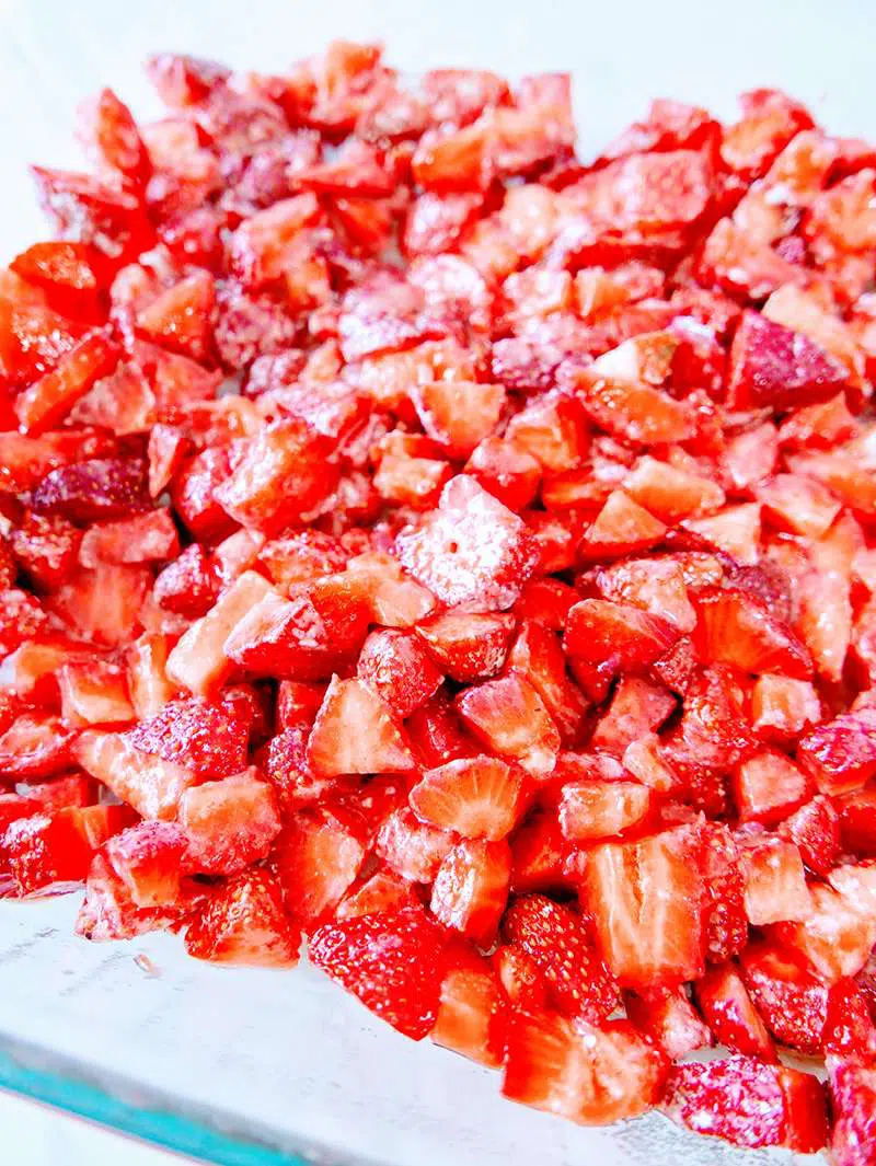Preparing Strawberries and cream cake mix crumble recipe