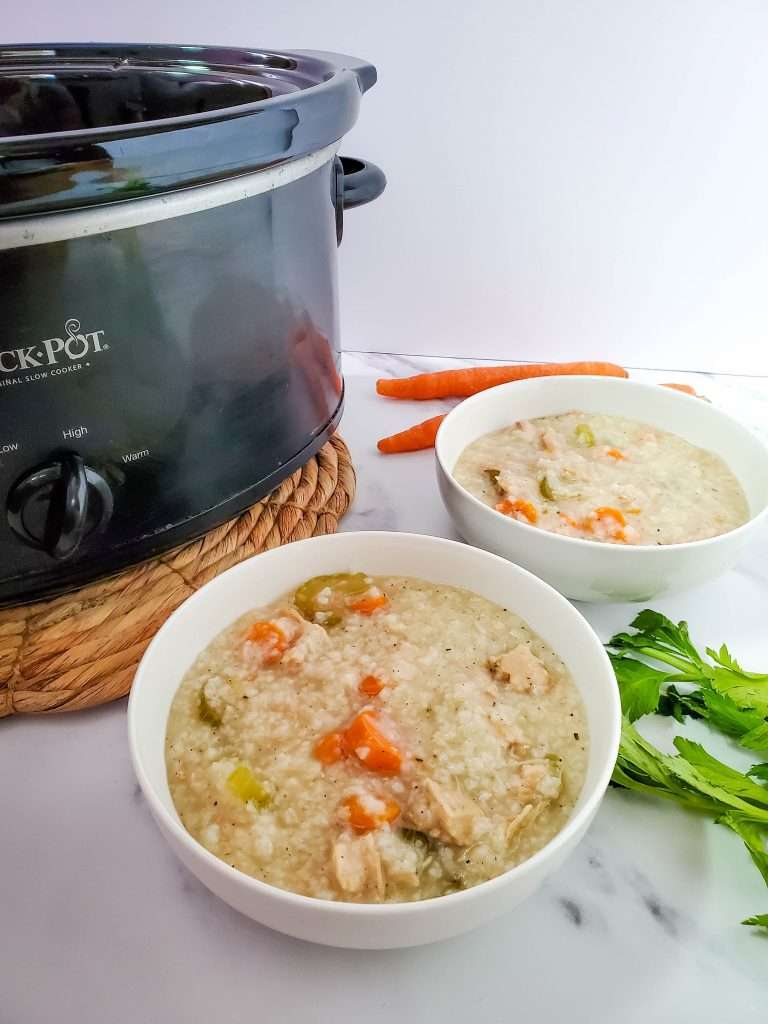 Crockpot Turkey and Rice Soup 12 crockpot turkey and rice soup in two bowls with a crockpot in the background