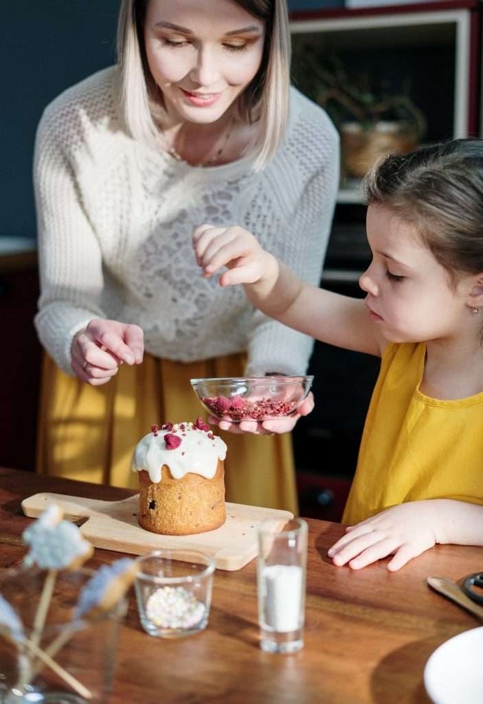 10 Fun Family Things to Do For Free 7 mother and daughter baking together in the kitchen
