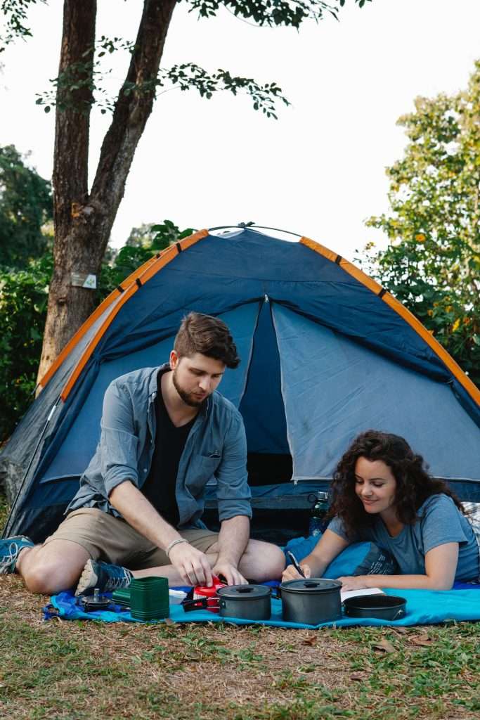 5 Cheap Date Night Ideas 6 couple camping together in a tent