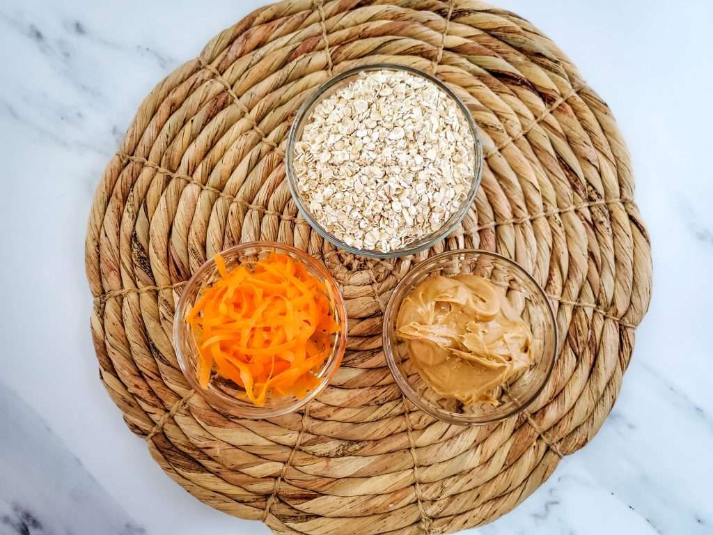 Crunchy Carrot & Oat Dog Biscuits (Yummy Recipe Treats!) 5 ingredients in small bowls for Crunchy Carrot & Oat Dog Biscuits