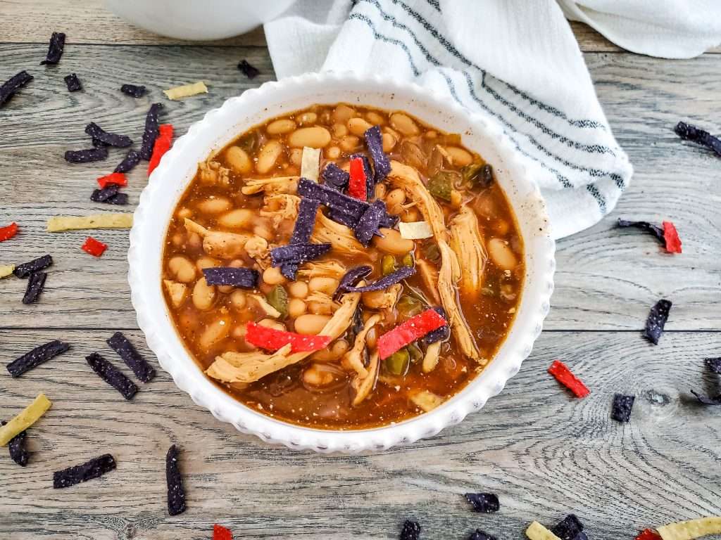 How to Make Chicken Chili in Your Crock Pot 10 crockpot chicken chili in a white bowl