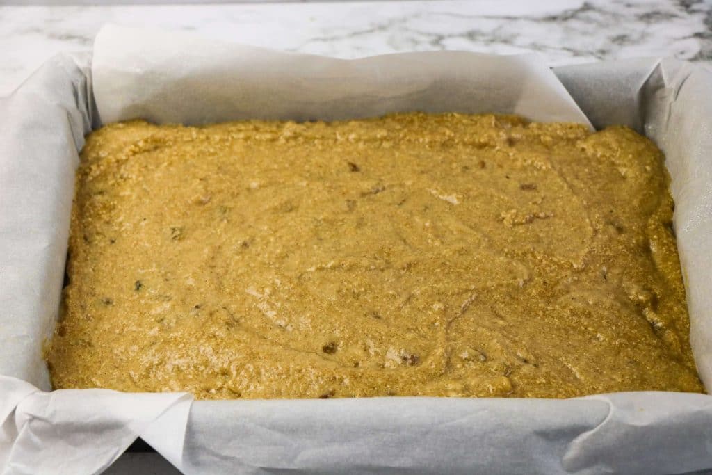 Old Fashioned Applesauce Spice Cake 10 applesauce spice cake batter spread in 9x13" baking pan ready for baking in the oven