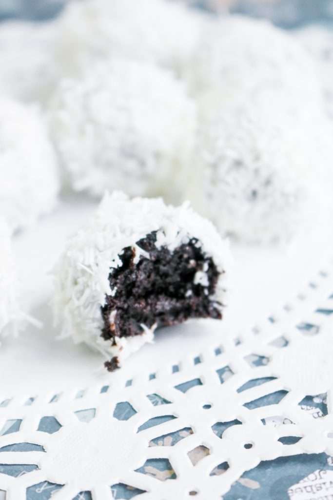 Snowball Oreo Truffles 5 snowball oreo truffle on a white plate