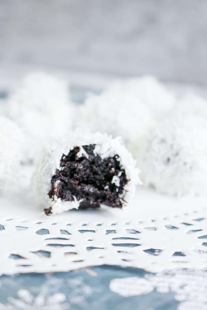 Snowball Oreo Truffles 11 chocolate snowball oreo truffle on a white plate