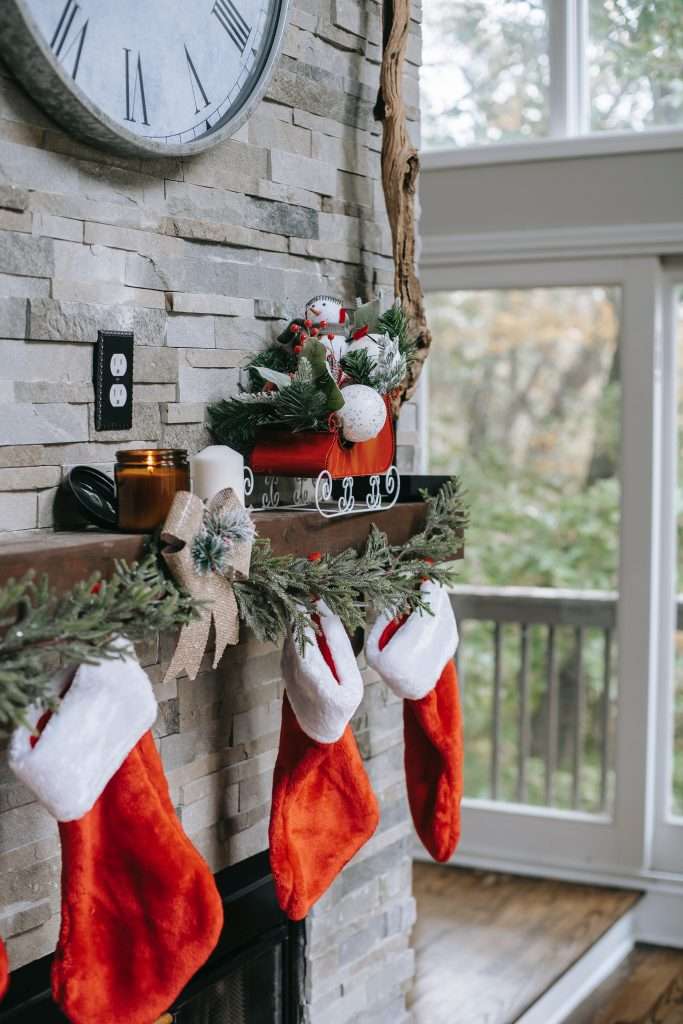 christmas stockings hanging on the mantel