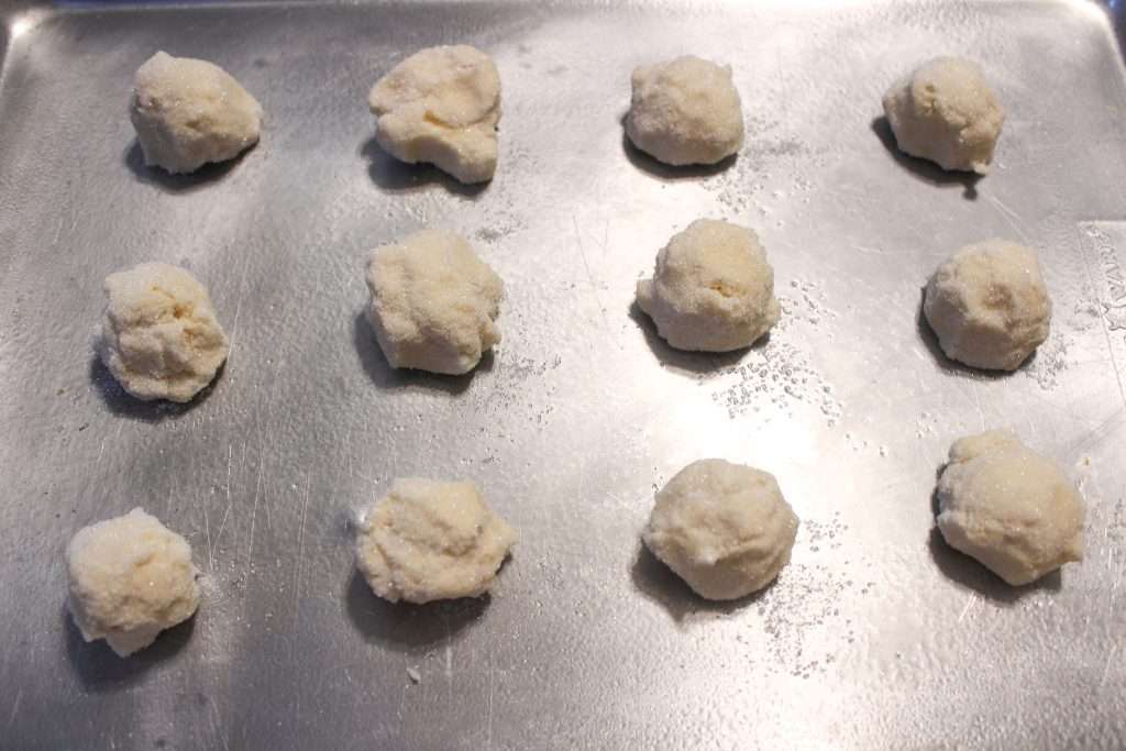 Soft and Chewy Lemon Sugar Cookies 9 lemon sugar cookie dough balls on sheet pan