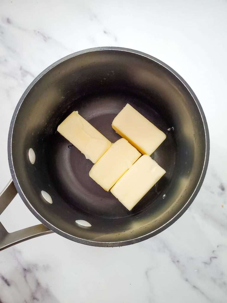 Christmas Crack 7 pot with pieces of butter in it