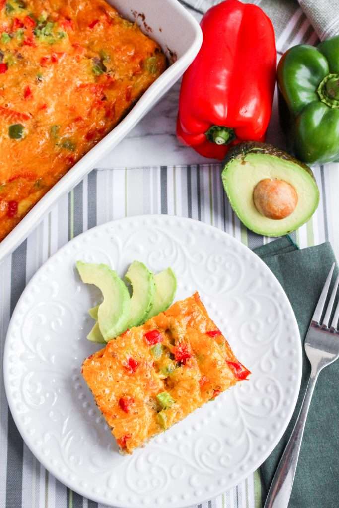 Christmas Breakfast Casserole 11 make ahead breakfast casserole for christmas morning on a white plate with peppers and avocado