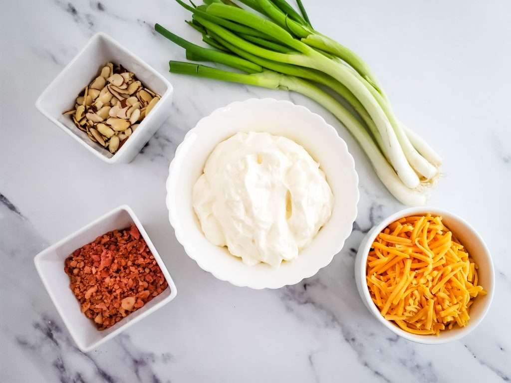 Neiman Marcus Dip 6 ingredients for neiman marcus dip on marble background