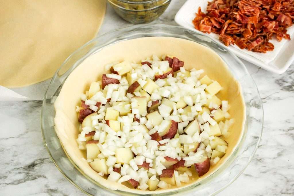 Delightful Savory Bacon Pie 8 onions and bacon in bowl
